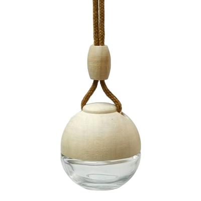 China Air Freshener 5ml Ball Shape Hanging Car Perfume Bottle With Wooden Lid For Air Freshener for sale