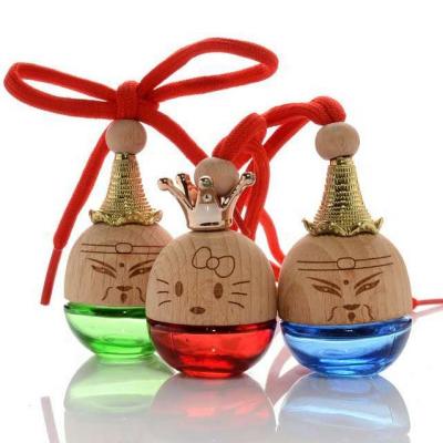 China Air Freshener 5ml Ball Shape Hanging Glass Perfume Bottle With Wooden Lid For Air Freshener for sale