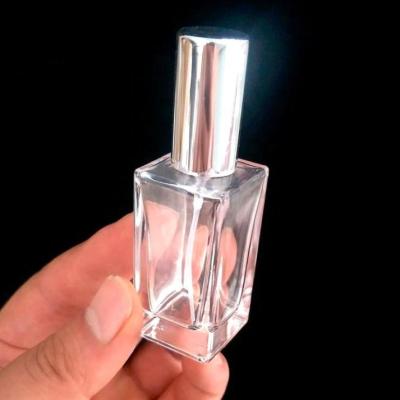 China Personal Care 15ml Empty Rectangular Clear Glass Sprayer Bottle for sale