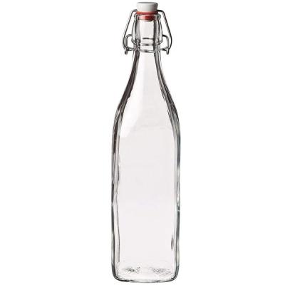 China 1L Clear Glass Beverage Square Bottle With Swing Top Cap for sale