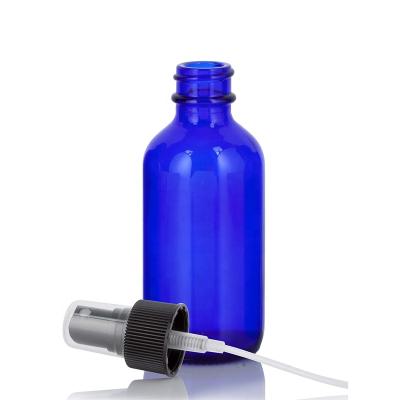 China Personal Care 2oz Cobalt Blue Empty Glass Spray Bottle With Black Fine Mist Sprayers for sale