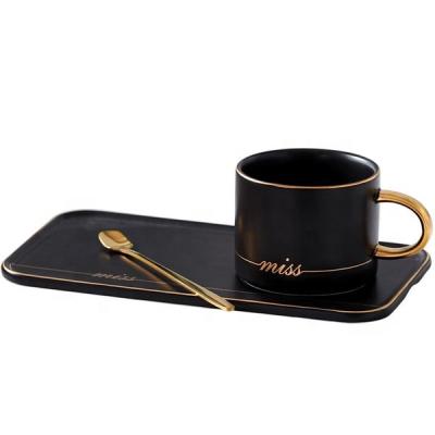 China 2020 Style New 220ml Nordic Black And White Viable Ceramic Coffee Mug With Gold Handle Spoon And Saucer for sale