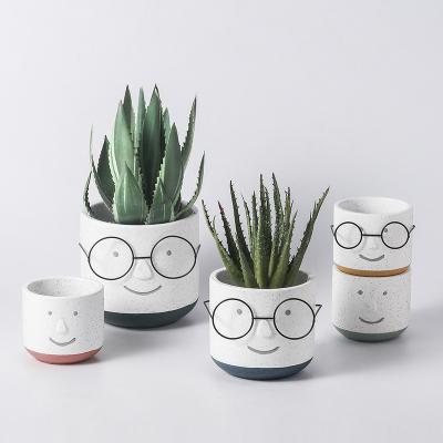 China Minimalist Wholesale Ceramic Succulent Planter Pot Plant Face Small Ceramic Flower Pots for sale