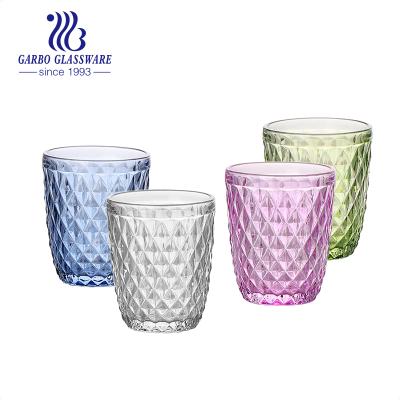 China 240ml Shabby Chic Colored Drinking Glasses Tumbler Embossed Glass Mug for sale