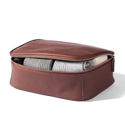 China 100% Eco-friendly PU Leather Makeup Brush Cosmetic Bag Travel Portable Toiletry Bags with Handle for Men and Women for sale