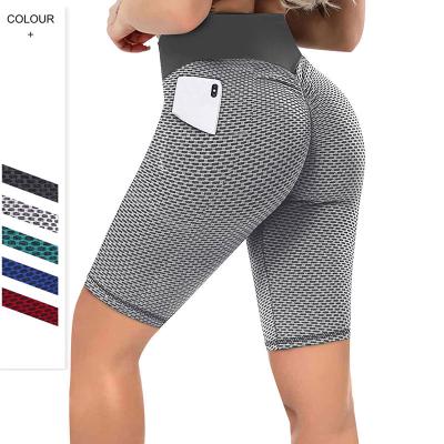 China Lightweight honeycomb hips yoga shorts pockets crack! crack! anti cellulite leggings shorts high elastic yoga shorts women for sale