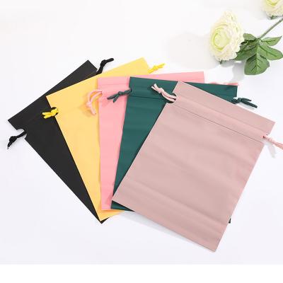 China Solid Color Recyclable Plastic Drawstring Bag PE Folding Eco - Friendly Storage Plastic Bag for sale