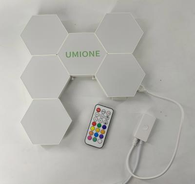 China Modern LED Wall Light DIY Smart Light Panels Hexagonal Modular Wall Light Touch Control for sale