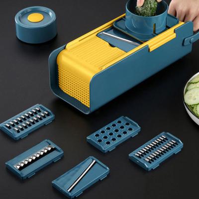 China Fashionable Multifunctional Vegetable Cutter Household Potato Chip Peeler Radish Grater Kitchen Tool Fruit Cutter Basket Vegetable Accessories for sale