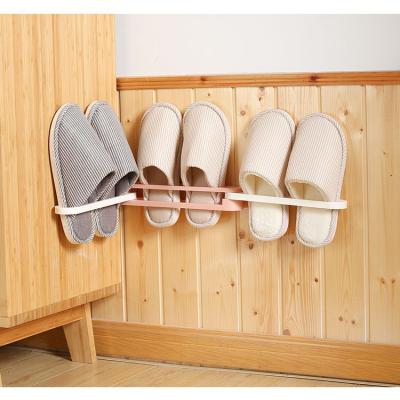 China Shoe Rack Portable Space Saving Slippers Rack Folding Wall Mounted Shoes Shelves Plastic Hanging Rack for sale