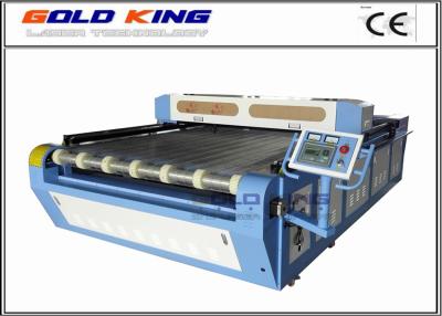 China Auto-feeding fabric laser cutting machine for wood, fabric, acrylic with best laser cnc router price for sale