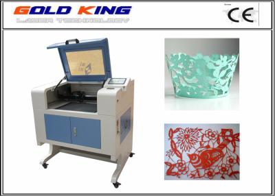 China cheap 40w laser cutting and engraving machine 6040 with motorized up and down working table and rotary axis for sale