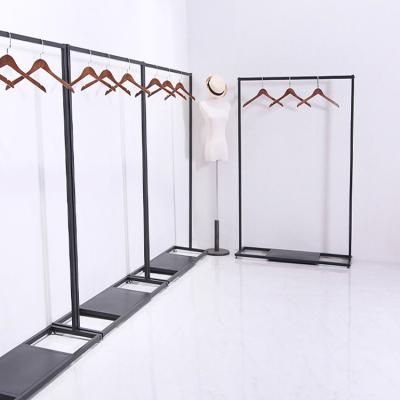 China Floor Standing Garment Clothes Display Rack Holder Metal Clothing Garment Hanging Display Rack for sale