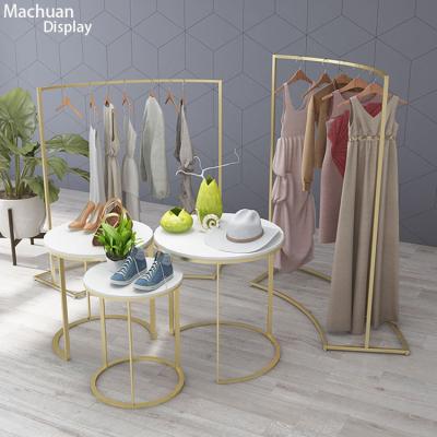 China Floor Standing Gold Garment Display Rack Furniture For Clothing Store for sale