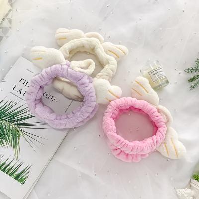 China Hair Accessories Spa Hair Accessories Fleece Peach Face Wash Makeup Coral Headband For Women for sale