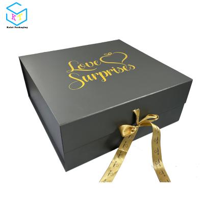 China Large Recyclable Custom Gray Magnetic Foldable Paper Flat Pack Gift Box With Ribbon for sale