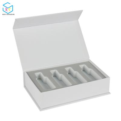 China Recyclable Luxury White Case Magnetic Closure Essential Oil Bottle Set Packaging With Sleeve for sale