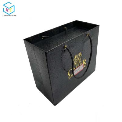 China Recyclable Custom Luxury Logo Printed Black Foldable Shopping Bags Caviar Packaging for sale