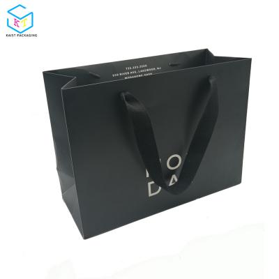 China Recyclable Custom Logo Matte Black Cloth Tote Shopping Paper Bag for sale