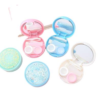 China Easy Transport Wholesale Cosmetic Contact Lenses Cases Container Boxes Bling Quicksand Luxury Fashion Contact Lens Suit Case for sale