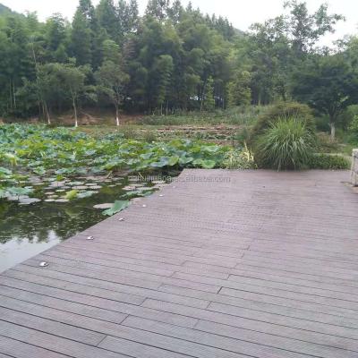 China Outdoor strong durable anti slip strandwoven bamboo moso decking by swimming pool for sale