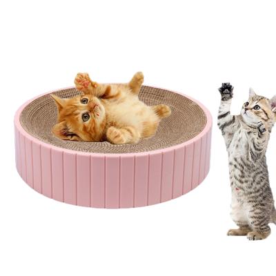 China Indoor Bed Stocked Cat Scratcher Cardboard from Paw Scratching Reversible Round Cat Scratcher Living Room with Catnip for sale