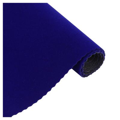 China Other economical and reliable dark blue velvet flock fabric based on non-woven material for high quality package upholstery for sale