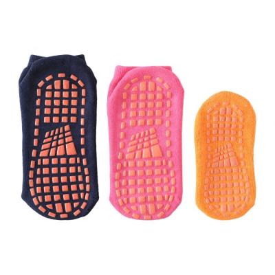 China Antibacterial Professional Non-slip Jumping Socks Rubber Unique Trampoline Socks With Grips for sale