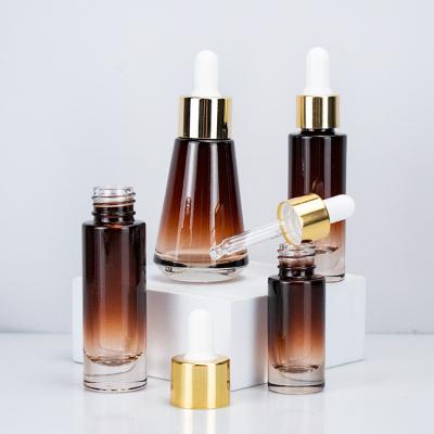 China Small 20ml Essential Oil Glass Bottle Shoulder 15ml Cosmetic Flat Glass Dropper Bottle With 10ml Dropper Serum Oil Bottle for sale