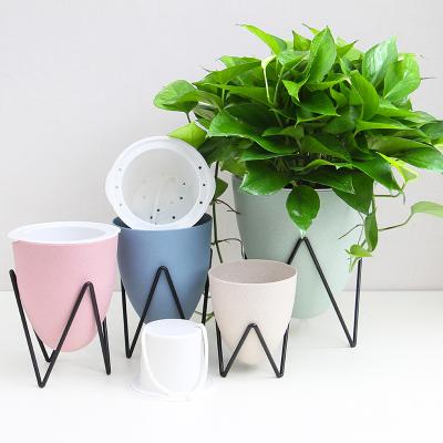 China Europe Wheat Straw Egg Shaped Lazy Wrought Iron Flower Pot Environmental Friendly Flower Pot for sale