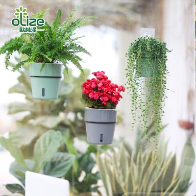 China New Fashion Wholesale Flower Pot Iron Frame Flower Pot Outdoor Ornamental Wall Mounted Lazy Plastic Fashion for sale