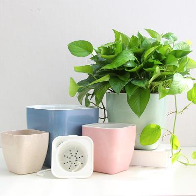 China Wholesale Biodegradable Fiber Circular Plastic Hydroponics Plants Absorption Self Watering Self Watering Flower Pot for sale