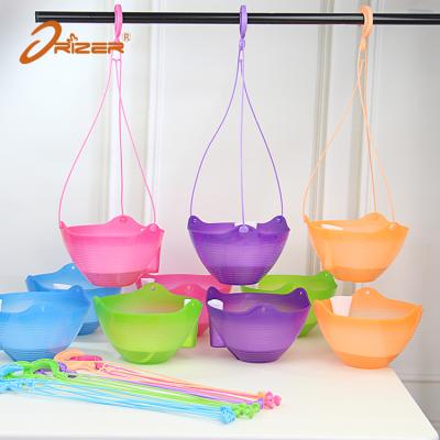 China Shape: 2020 Factory Price Round Cheap Hanging Vertical Colorful Plastic Self Garden Plant Watering Pot For Nursery for sale