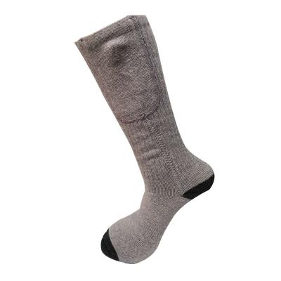 China The new sports heating bumps fever men's and women's winter electric warm filling feet walking heating socks for sale