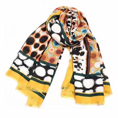 China 2021 cotton squishy ladies print fashionable soft soft point print leopard shawl tassel cotton squishy scarf for sale