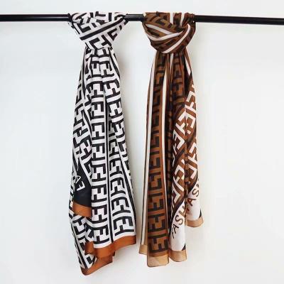 China 2021 New Women's Chiffon Silk Beach Towel Fashion Design Printed Muslim Scarf Chiffon Scarf for sale