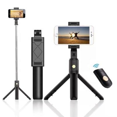 China Folding Mini Portable Monopod Amazon Tripod K07 Wireless Bluetooth Selfie Stick Best Selling For iPhone Huawei Android Phones for sale