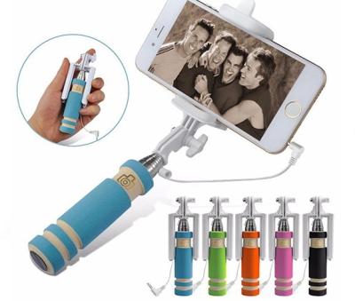 China 2021 Super Selling Selfie Mini Portable Monopod Folding Amazon Best New Mini Cable Stick With Anti Slip Foam Handle for sale