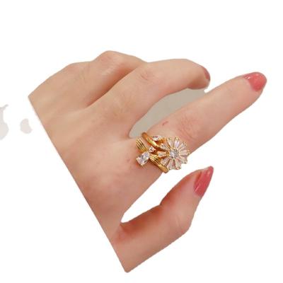 China Other Plated Simple Flower Zircon Rotating Ring With Real Gold Aperture Can Adjust Women's Fashion Ins to Rotate Ring. for sale