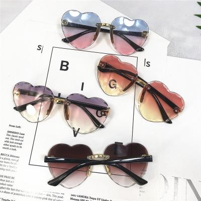 China High quality heart diamond balanced anti-ultraviolet sun-shading rimless sunglasses love-shaped children's sunglasses for sale