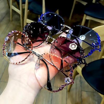 China Fashion Sunglasses 2022 Rimless Sunglasses Women Diamond Polarized Sun Glasses Custom High Quality Fashion Sun Glasses for sale