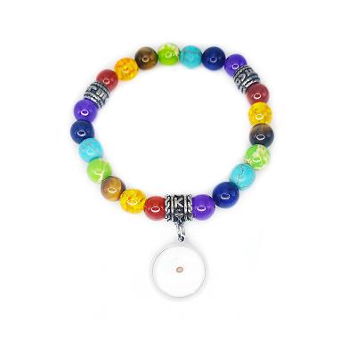 China CLASSIC Wholesale 8MM Mustard Seed 7 Chakra Beads Stainless Steel Charm Elastic Bracelet Christian Jewelry For Women for sale