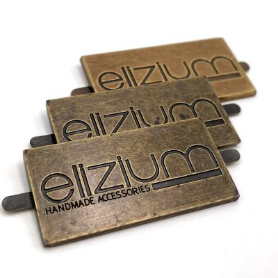 China Factory Wholesale OEM Metal Logo Label Custom Brand Zinc Alloy Washable Tag For Garment Bags Shoes for sale