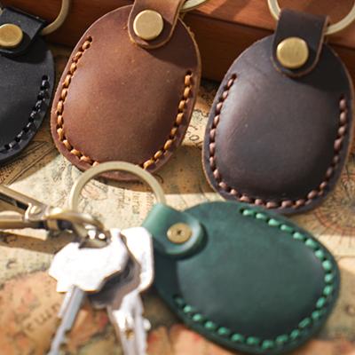 China For Airtags Personalized Tracker Leather Case Protective Case For AirTags Leather Holder With Key Chain For AirTag for sale