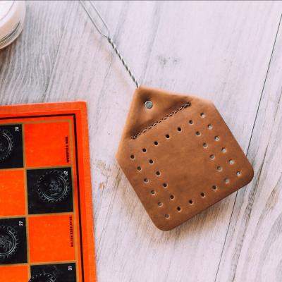 China Durable Wholesale Leather Fly Swatter Mosquito Killing Tool Durable Swatter for sale