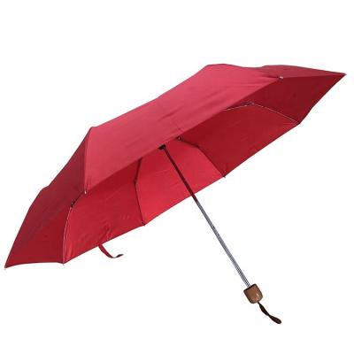 China Cheap Red Rain Waterproof Custom Sun Logo Tape Fabric Waterproof UV Resistant Umbrellas Strong Windproof 3 Times With Logo Printing for sale