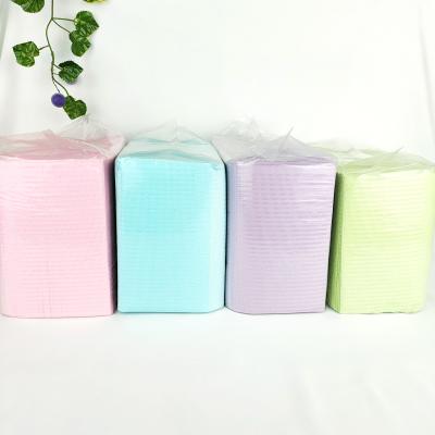 China Disposable Dental Napkin Tooth Pad Dental Sling Does Not Bind 125 Pieces/Pack for sale