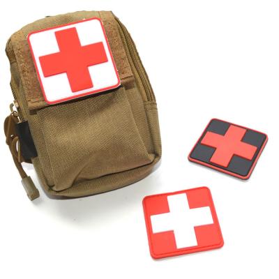 China Team Morale PVC Hook & Loop Custom Viable Outdoor Medical Rescue Badges Red Cross Rubber Armband for sale