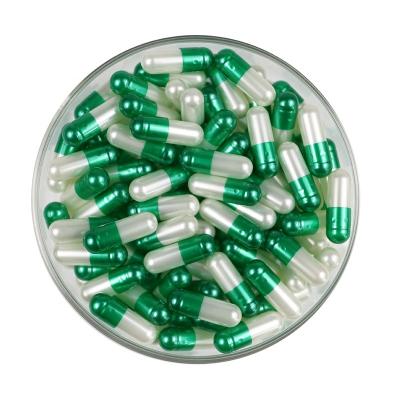 China Wholesale empty gelatin (pharma grade) softgels size 0 clear transparent vegetable veggie separated capsules manufacturer in green color for sale