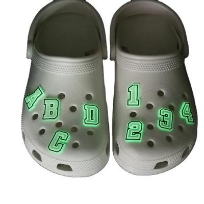 China Popular Waterproof Hot Selling Black And White PVC A-Z Letters Number 1-9 Glow Clog Charms Luminous Croc Glow In The Dark for sale